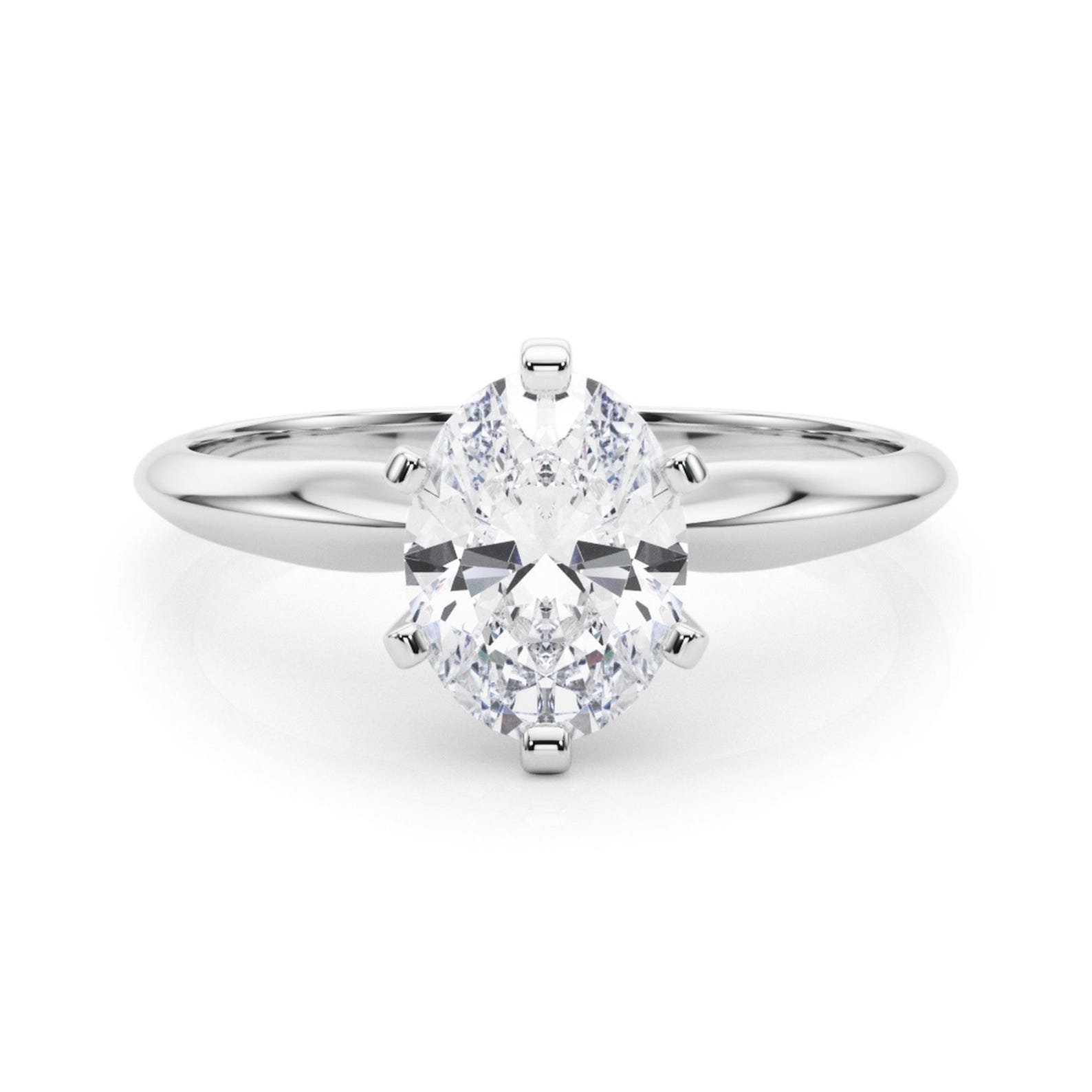 400548_8d774bc5626c481ead0899bb521d48c6mv2.jpg 950 Platinum 1ct Oval-Cut Moissanite Diamond Solitaire Ring - Image 1