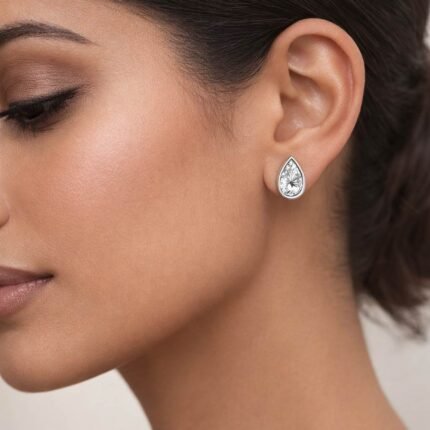 Pear Cut Diamond Bezel Set Solitaire Stud Earrings in 950 Platinum