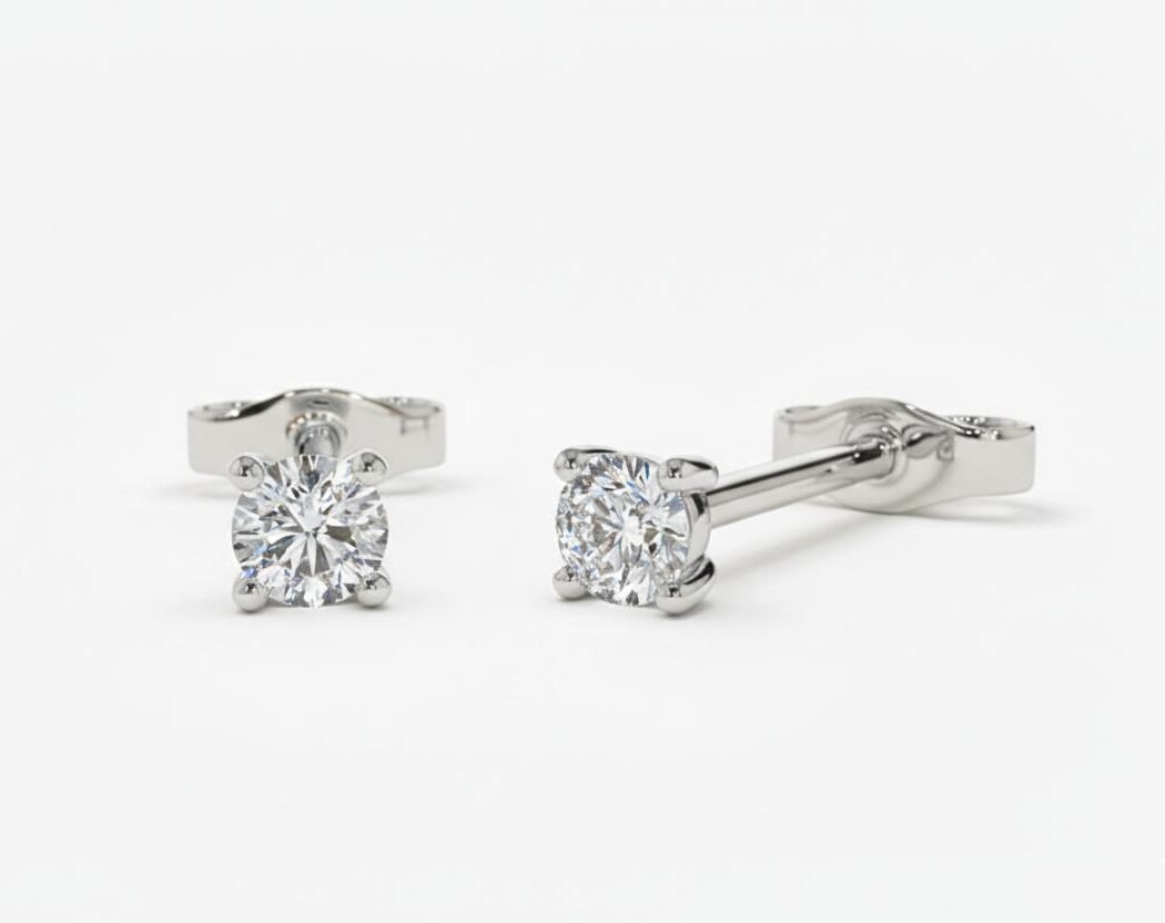Round Brilliant Cut 0.20 CT Diamond Stud Earrings in 950 Platinum with Classic 4 Prong Setting Round Brilliant Cut 0.20 CT Diamond Stud Earrings in 950 Platinum with Classic 4 Prong Setting